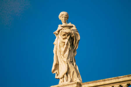 Vatican City Italy October 18, 2019 View of marble statues located at the St Peter's Basilica square in the Vatican City in the afternoonのeditorial素材