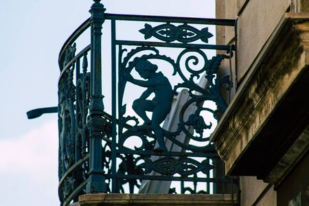 Athens Greece September 12, 2019 Closeup of a balcony on a facade of a house in the Plaka neighborhood in the afternoonの写真素材