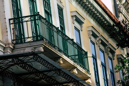 Athens Greece September 12, 2019 Closeup of a balcony on a facade of a house in the Plaka neighborhood in the afternoonの写真素材