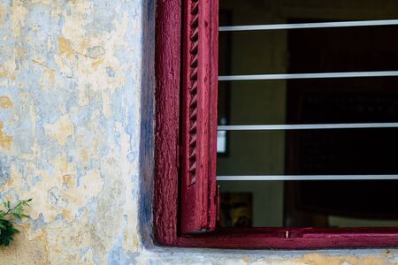 Athens Greece September 4, 2019 View of colorful window on a facade of a building in the Plaka neighborhood in the late afternoonの写真素材