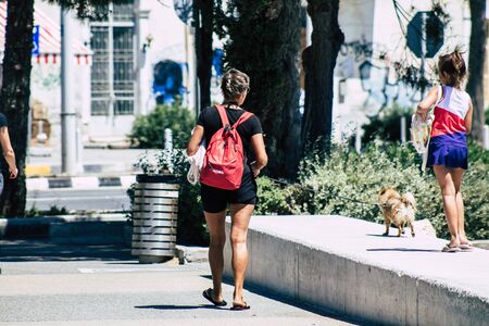 Limassol Cyprus May 28, 2020 View of unidentified young girl walking in the streets of Limassol in Cyprus islandの写真素材