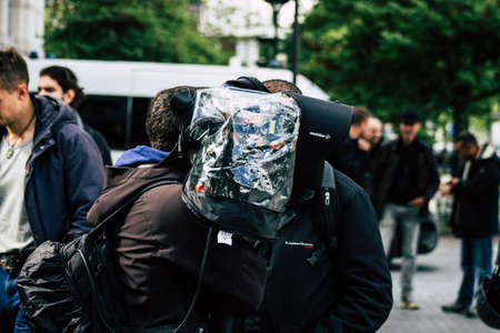 Paris France May 11, 2019 View of press journalist covering protests of the Yellow Jackets against the policy of President Macron in Paris on saturday afternoonのeditorial素材