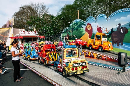 Reims France April 21, 2019 View of fun fair with its colorful stands located in the center of the city of Reims in the afternoonのeditorial素材