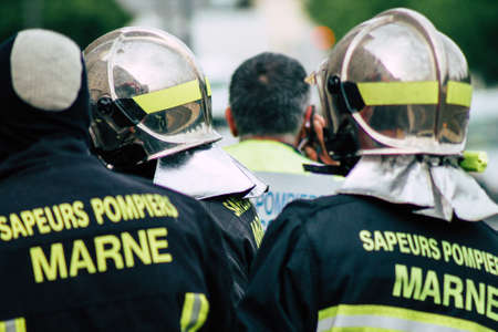 Reims France May 18, 2019 View of firefighters extinguishing a construction hut burned by rioters...
