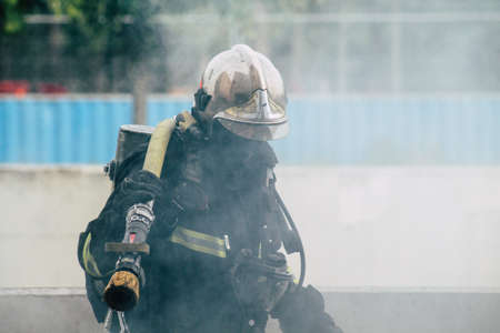 Reims France May 18, 2019 View of firefighters extinguishing a construction hut burned by rioters...