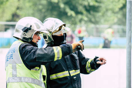 Reims France May 18, 2019 View of firefighters extinguishing a construction hut burned by rioters...