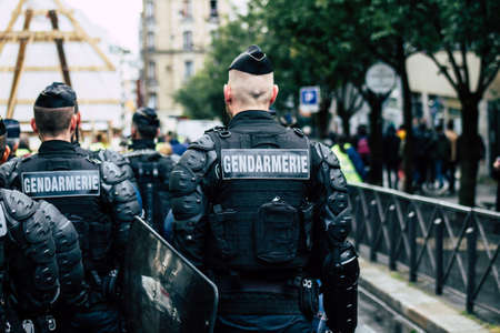 Paris France May 04, 2019 View of a riot squad of the French National Gendarmerie in intervention during protests of the Yellow Jackets against the policy of President Macron in Paris on saturday afternoonのeditorial素材