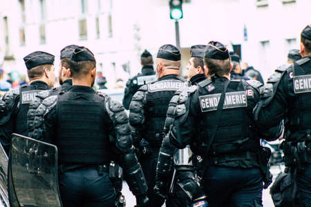 Paris France May 04, 2019 View of a riot squad of the French National Gendarmerie in intervention during protests of the Yellow Jackets against the policy of President Macron in Paris on saturday afternoonのeditorial素材