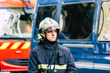 Paris France May 04, 2019 View of a French firefighters walking in the street during protests of the Yellow jackets against the policy of President Macron in Paris on saturday afternoonのeditorial素材