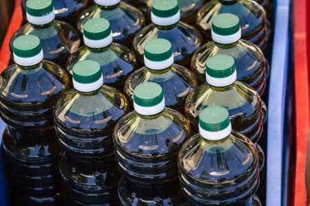View of fresh extra virgin olive oil sold at the market of Limassol in Cyprus island