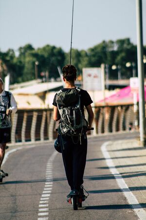 Tel Aviv Israel June 10, 2019 View of unknown Israeli people rolling with a electric scooter in the...