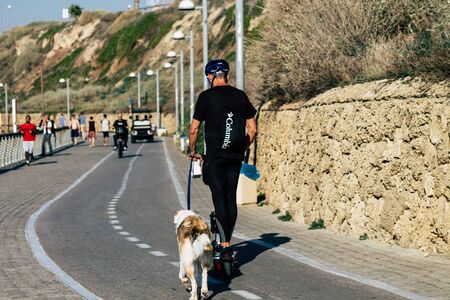 Tel Aviv Israel December 22, 2019 View of unidentified people rolling with a electric scooter in the...