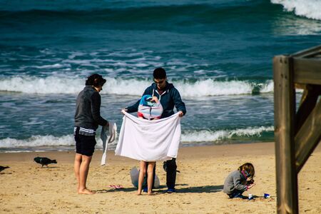 Tel Aviv Israel February 17, 2020 View of unidentified Israeli people having fun on the beach of Tel...