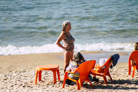 Tel Aviv Israel February 15, 2020 View of unidentified Israeli people having fun on the beach of Tel Aviv during a sunny day in winterのeditorial素材
