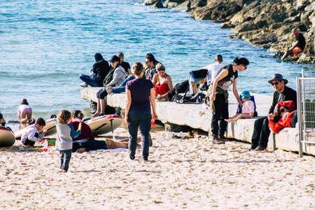Tel Aviv Israel February 15, 2020 View of unidentified Israeli people having fun on the beach of Tel...