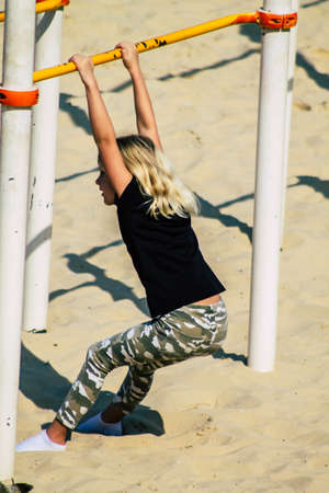 Tel Aviv Israel February 17, 2020 View of unidentified Israeli people having fun on the beach of Tel Aviv in winterのeditorial素材