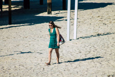 Tel Aviv Israel February 15, 2020 View of unidentified Israeli people having fun on the beach of Tel Aviv during a sunny day in winterのeditorial素材