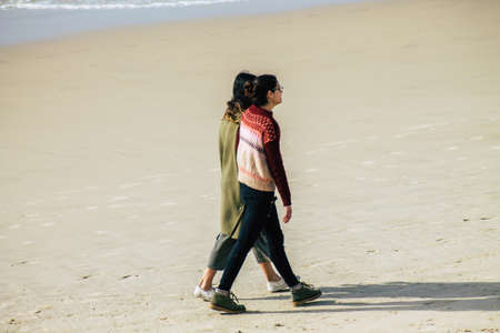 Tel Aviv Israel February 22, 2020 View of unidentified Israeli people having fun on the beach of Tel Aviv in winterのeditorial素材
