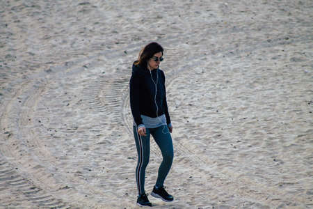 Tel Aviv Israel February 17, 2020 View of unidentified Israeli people having fun on the beach of Tel Aviv in winterのeditorial素材