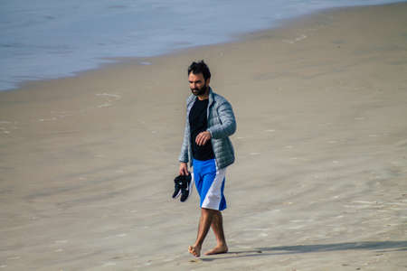 Tel Aviv Israel February 22, 2020 View of unidentified Israeli people having fun on the beach of Tel Aviv in winterのeditorial素材
