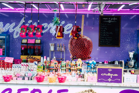 Reims France April 21, 2019 View of fun fair with its colorful stands located in the center of the city of Reims in the afternoonのeditorial素材
