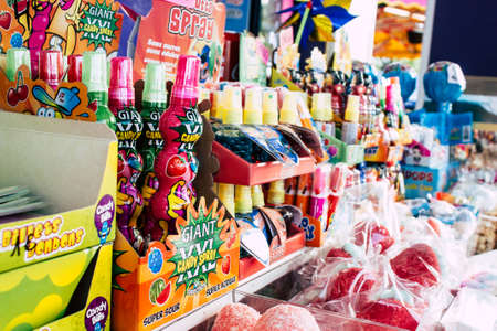 Reims France April 21, 2019 View of fun fair with its colorful stands located in the center of the city of Reims in the afternoonのeditorial素材