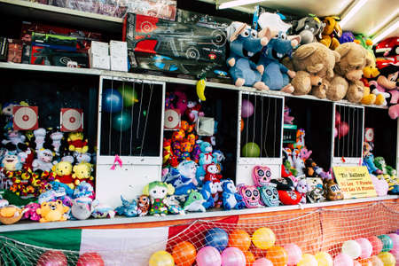 Reims France April 21, 2019 View of fun fair with its colorful stands located in the center of the city of Reims in the afternoonのeditorial素材