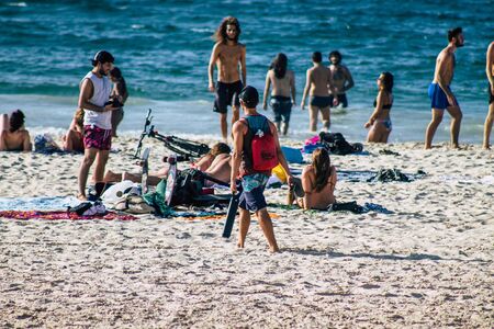 Tel Aviv Israel October 08, 2019 View of unknowns people having fun on the beach of Tel Aviv in the afternoonの写真素材