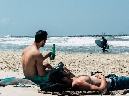 Tel Aviv Israel April 20, 2019 View of unknown Israeli people having fun on the beach of Tel Aviv...