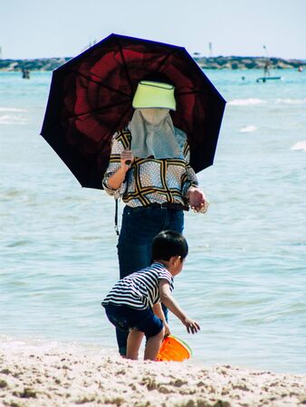 Tel Aviv Israel May 29, 2019 View of unknown Israeli people having fun on the beach of Tel Aviv in the afternoonの写真素材