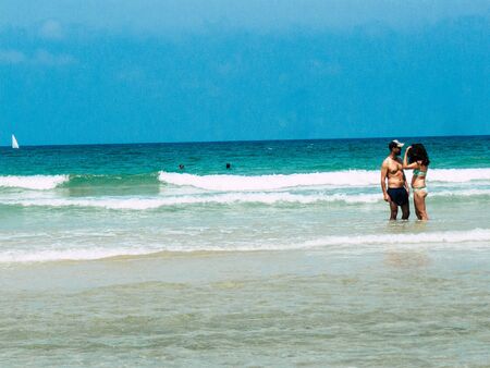 Tel Aviv Israel June 9, 2019 View of unknown Israeli people having fun on the beach of Tel Aviv in the afternoonの写真素材