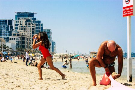 Tel Aviv Israel June 9, 2019 View of unknown Israeli children having fun on the beach of Tel Aviv in the afternoonの写真素材