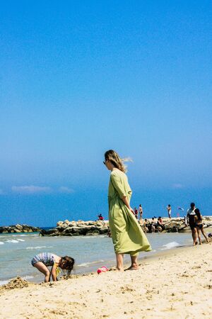 Tel Aviv Israel June 9, 2019 View of unknown Israeli children having fun on the beach of Tel Aviv in the afternoonの写真素材