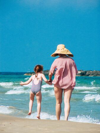 Tel Aviv Israel June 2, 2019 View of unknown Israeli children and parent having fun on the beach of Tel Aviv in the afternoonの写真素材