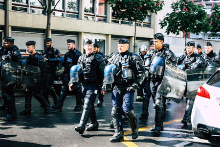 Paris France May 04, 2019 View of a riot squad of the French National Gendarmerie in intervention during protests of the Yellow Jackets against the policy of President Macron in Paris on saturday afternoonのeditorial素材