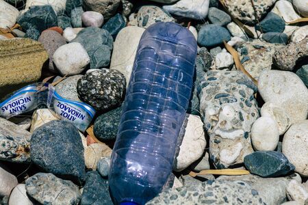 Limassol Cyprus June 12, 2020 Closeup of various pollution of metallic and plastic waste found on one of the natural beaches near the town of Limassol in Cyprusの写真素材
