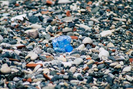 Limassol Cyprus June 12, 2020 Closeup of various pollution of metallic and plastic waste found on one of the natural beaches near the town of Limassol in Cyprusの写真素材