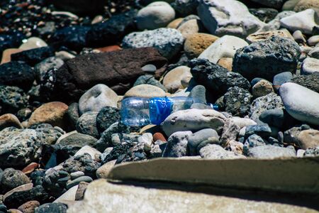 Limassol Cyprus June 12, 2020 Closeup of various pollution of metallic and plastic waste found on one of the natural beaches near the town of Limassol in Cyprusの写真素材