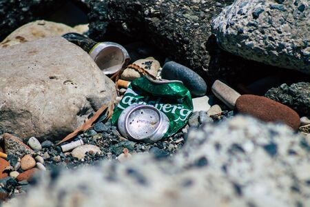 Limassol Cyprus June 12, 2020 Closeup of various pollution of metallic and plastic waste found on one of the natural beaches near the town of Limassol in Cyprusの写真素材