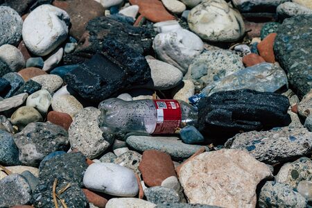 Limassol Cyprus June 12, 2020 Closeup of various pollution of metallic and plastic waste found on one of the natural beaches near the town of Limassol in Cyprusの写真素材