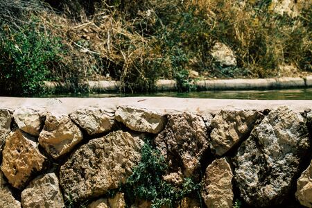 Jerusalem Israel June 21, 2019 View of the landscape and nature at Rephaim Stream park in the white valley near Jerusalem in the afternoonの写真素材