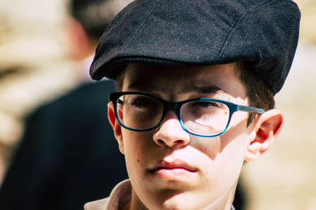Jerusalem Israel June 19, 2019 View of young Israeli kid praying at the Western wall in the Old city...