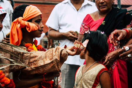 Kathmandu Nepal August 27, 2018 Portrait of unknown Hindu kid visiting the Pashupatinath temple in the morningのeditorial素材