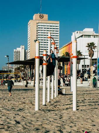 Tel Aviv Israel February 9, 2019 View of unknowns Israeli kids playing on the beach of Tel Aviv in the afternoonのeditorial素材