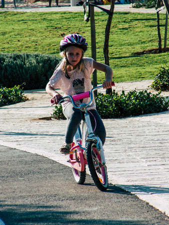 Jerusalem Israel September 11, 2018  View of Israeli kids playing with a bicycle in the street of Jerusalem in the afternoonのeditorial素材