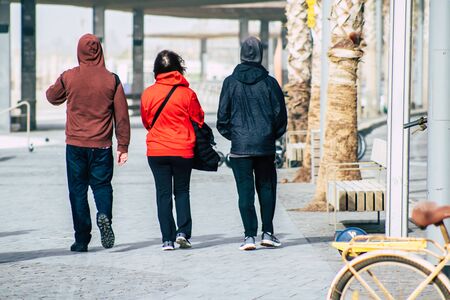Tel Aviv Israel December 25, 2019 View of unidentified people walking on Herbert Samuel Promenade in Tel Aviv in winterの写真素材