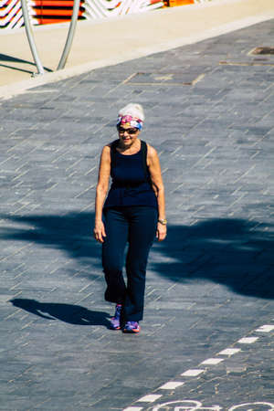 Tel Aviv Israel February 13, 2020 View of unidentified people walking on Herbert Samuel Promenade in Tel Aviv during a sunny day in winterのeditorial素材