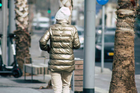 Tel Aviv Israel December 25, 2019 View of unidentified people walking on Herbert Samuel Promenade in Tel Aviv in the afternoonのeditorial素材