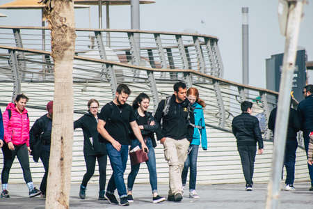 Tel Aviv Israel December 25, 2019 View of unidentified people walking on Herbert Samuel Promenade in Tel Aviv in the afternoonのeditorial素材