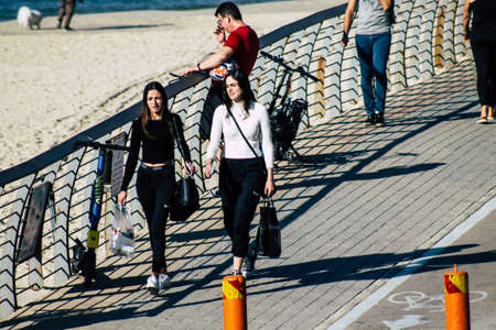 Tel Aviv Israel December 22, 2019 View of unidentified people walking on Herbert Samuel Promenade in Tel Aviv in the afternoonのeditorial素材